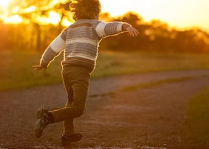 Boy running in sunlight.jpg
