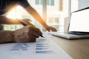 documents-confidence-pointing-paper-graphs-financial